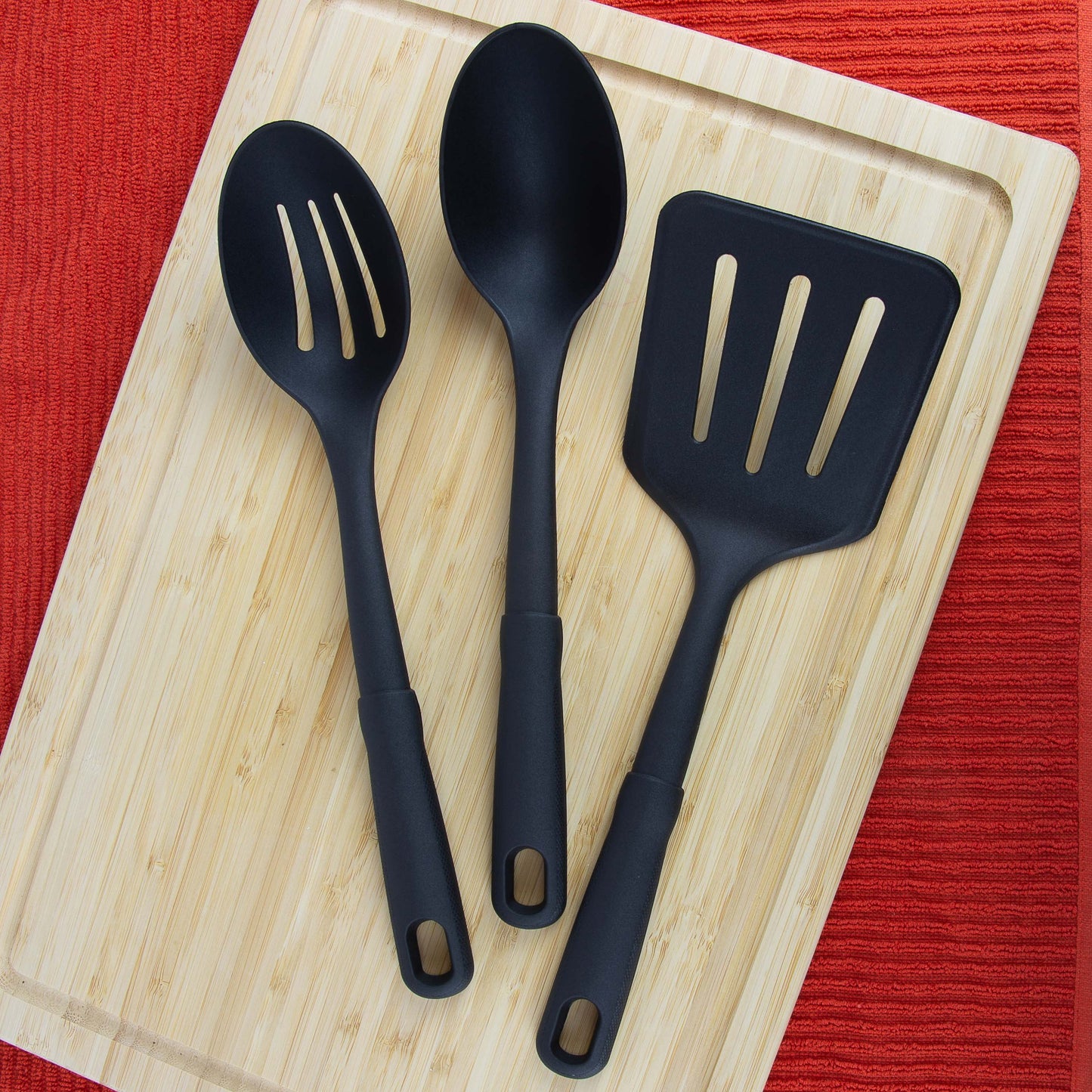 3-piece kitchen utensil set. slotted spatula. slotted spoon and solid spoon. black. nylon